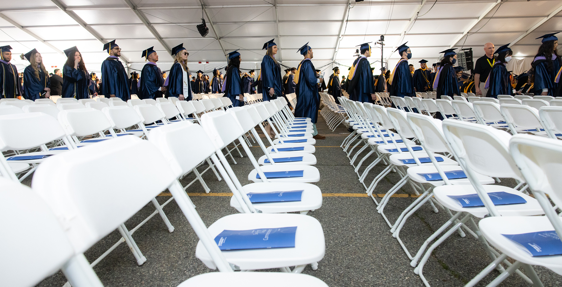 students standing in line at commencement