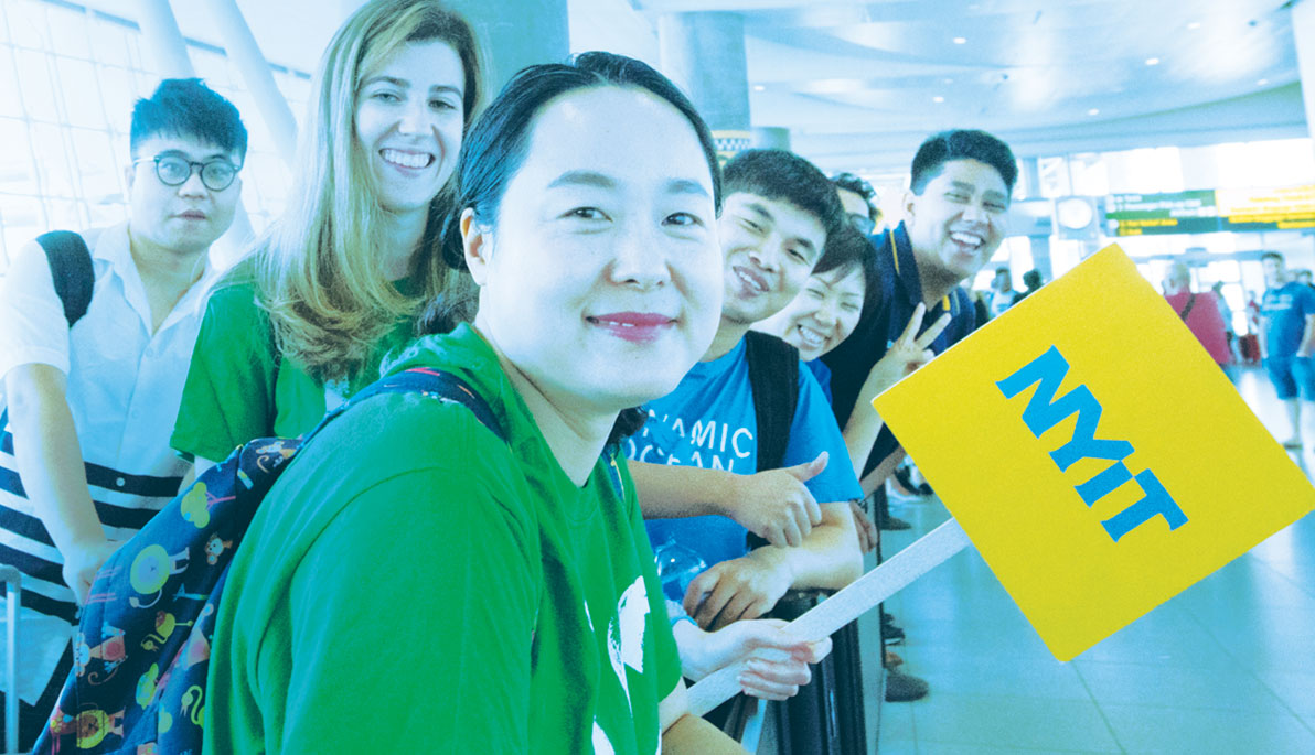 NYIT staff members and student ambassadors at John F. Kennedy International Airport.