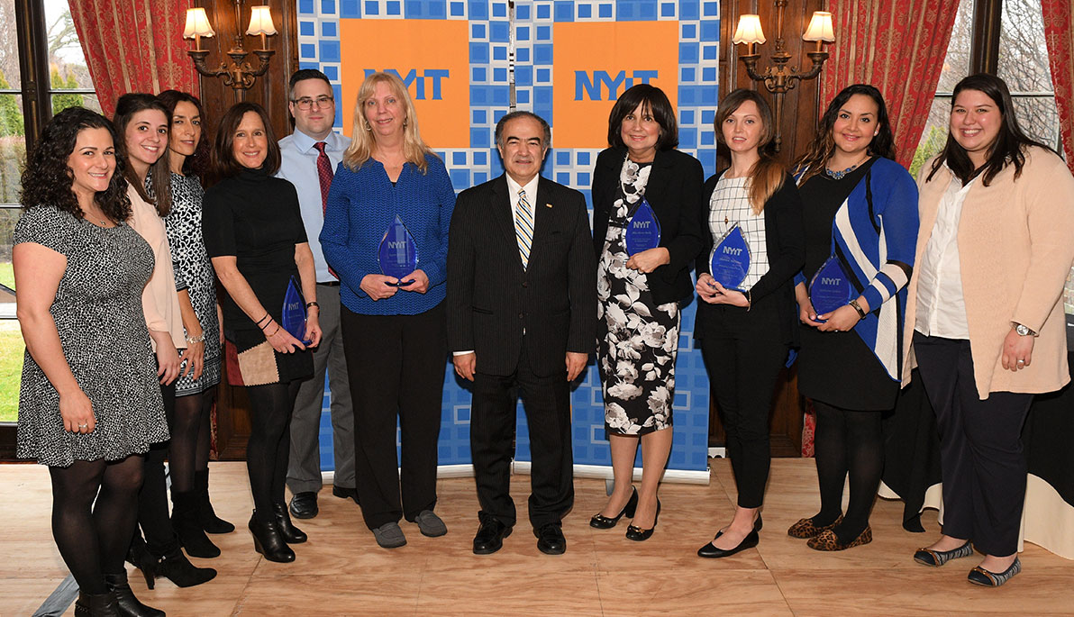 The winners of the first NYIT Staff Appreciation Day with Interim President Rahmat Shoureshi.