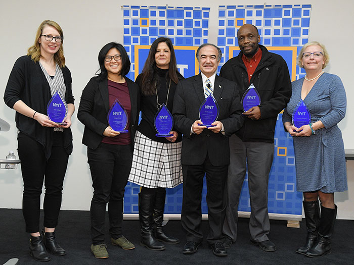 NYIT Staff Appreciation Day winners with Interim President Rahmat Shoureshi.