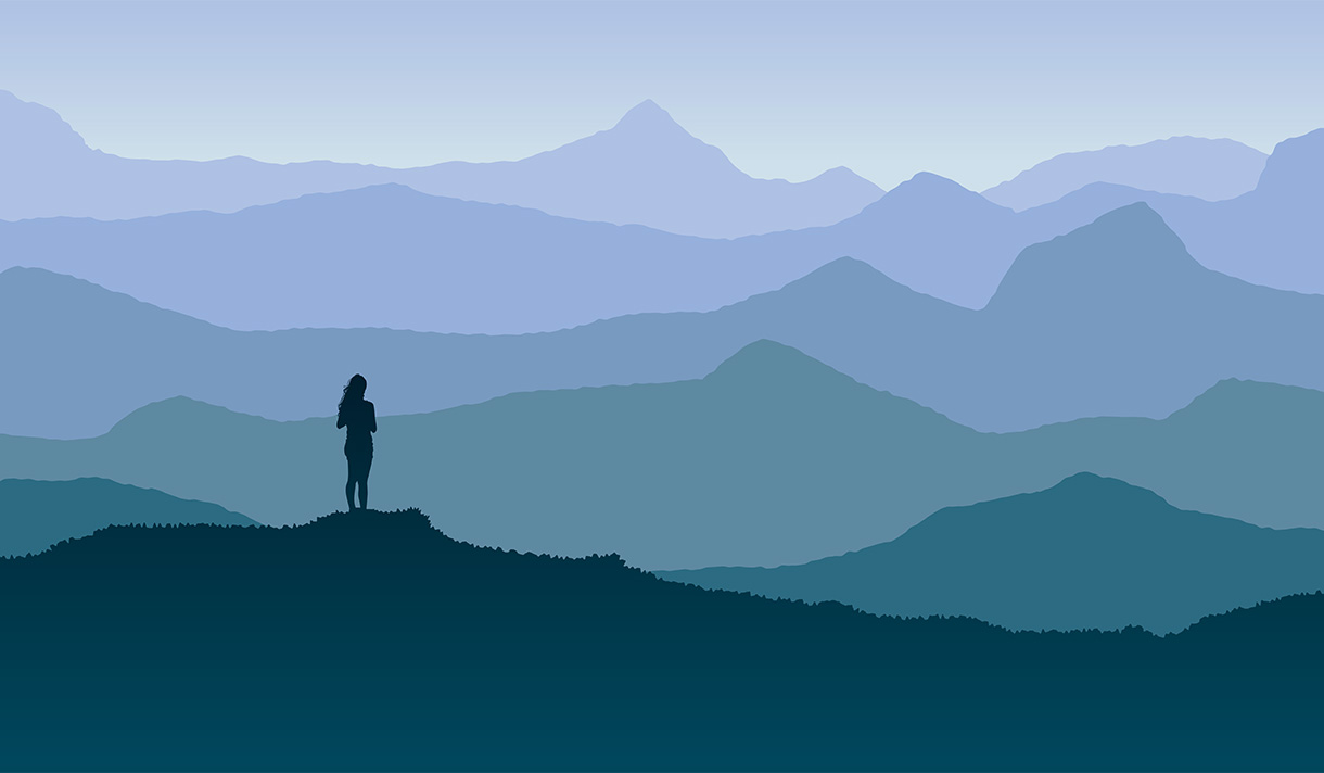 Person overlooking a mountain view