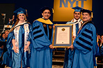 Honorary degree recipient, Humayun J. Chaudhry (D.O. ’91), with Interim President Shoureshi and student marshals, Erica Brandt and Raiyan Islam.