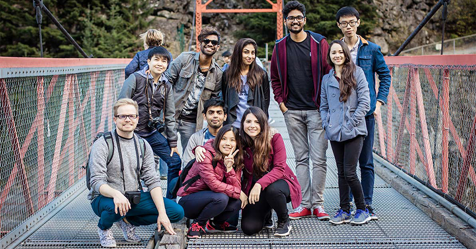 Students assembled on footbridge