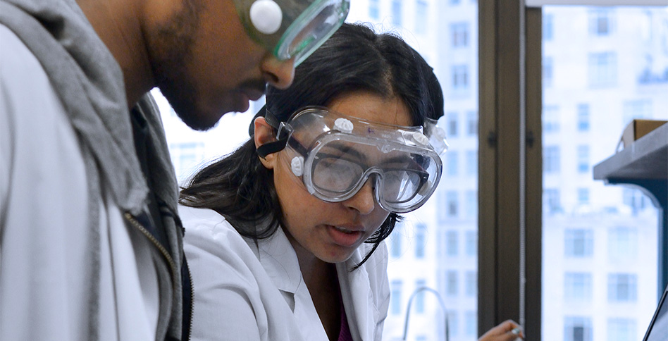 Students in lab wearing goggles