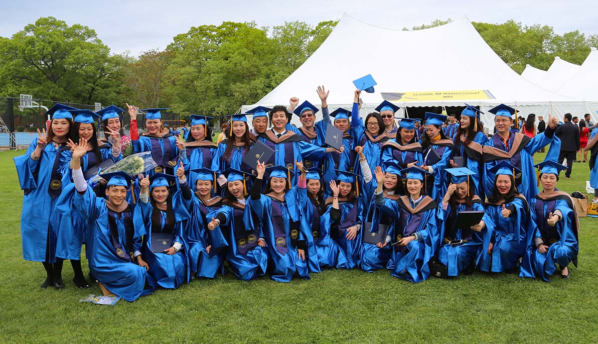 Graduates from China participating in the NYIT Commencement in Old Westbury
