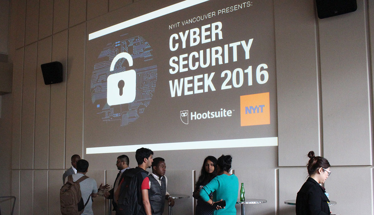 NYIT students conversing at Cyber Security Week 2016