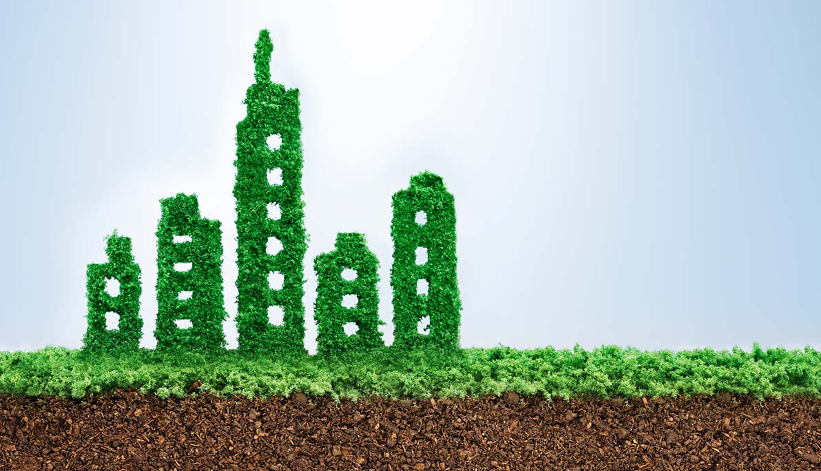 Illustration of green buildings made out of of grass.