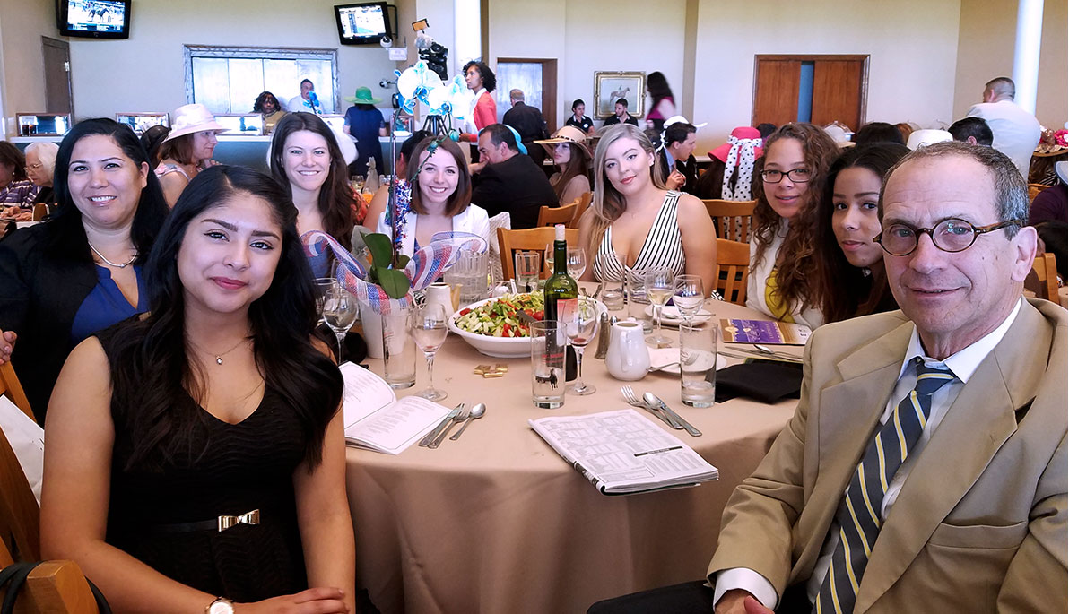 NYIT staff and students with Professor Donald Fizzinoglia at the 2016 Latina Hat Luncheon.