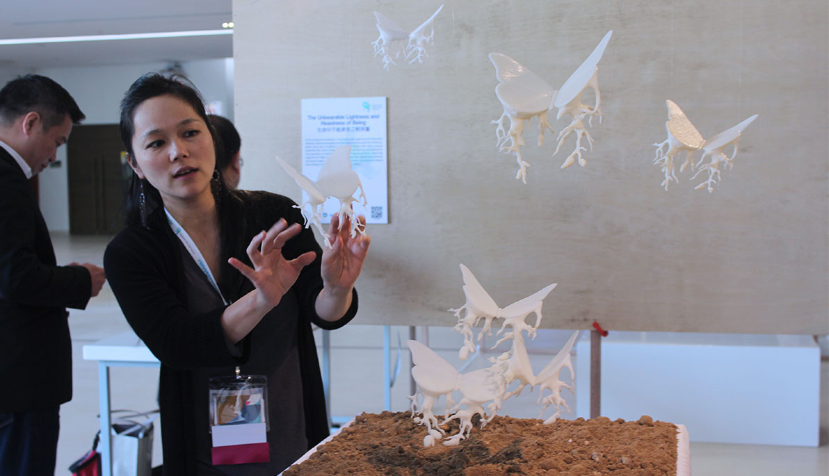 NYIT Associate Professor Yuko Oda presenting her art installation at SIGGRAPH Asia.