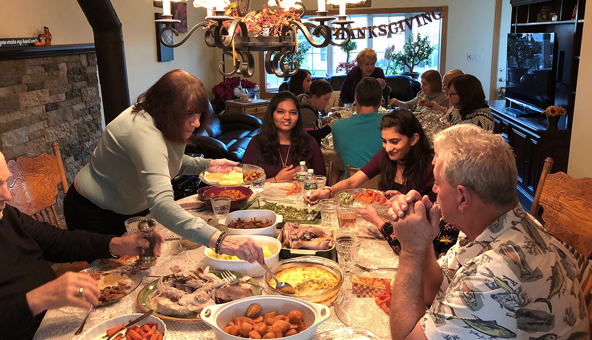 International students Pranati Mathur and Pragya Dugar enjoyed Thanksgiving in the Long Island home of Michelle Ranaldo of the V
