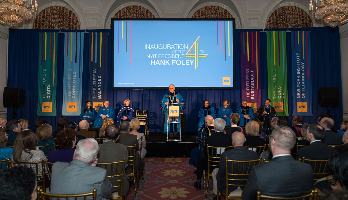New York Tech President Hank Foley at the podium