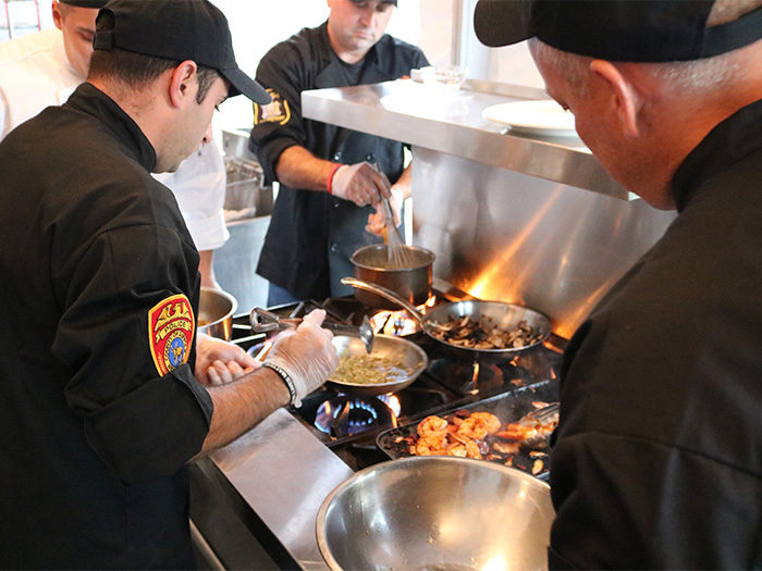 Police officers cooking