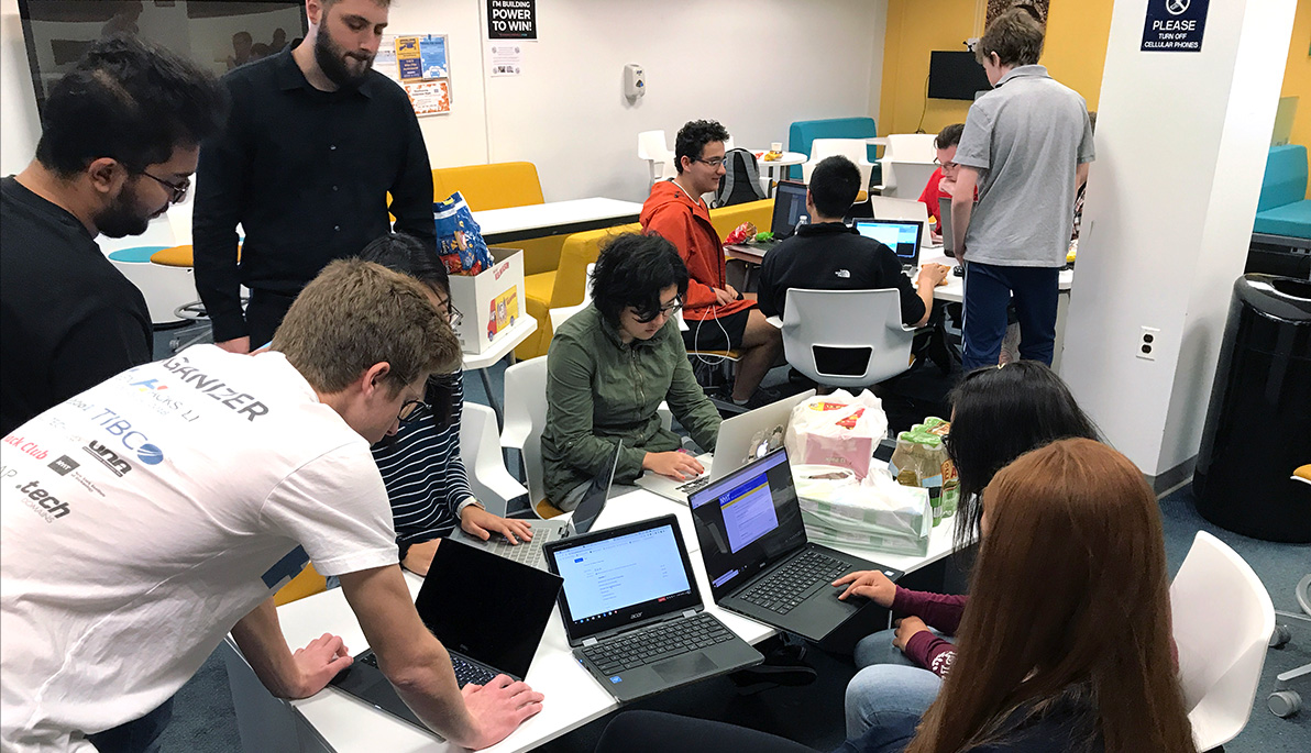 Students at the NYIT hackathon.