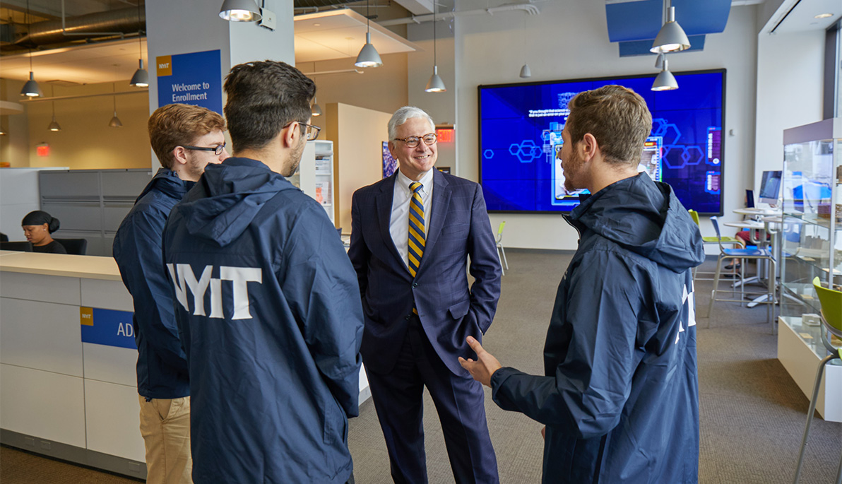 President Foley with students on the New York City campus.