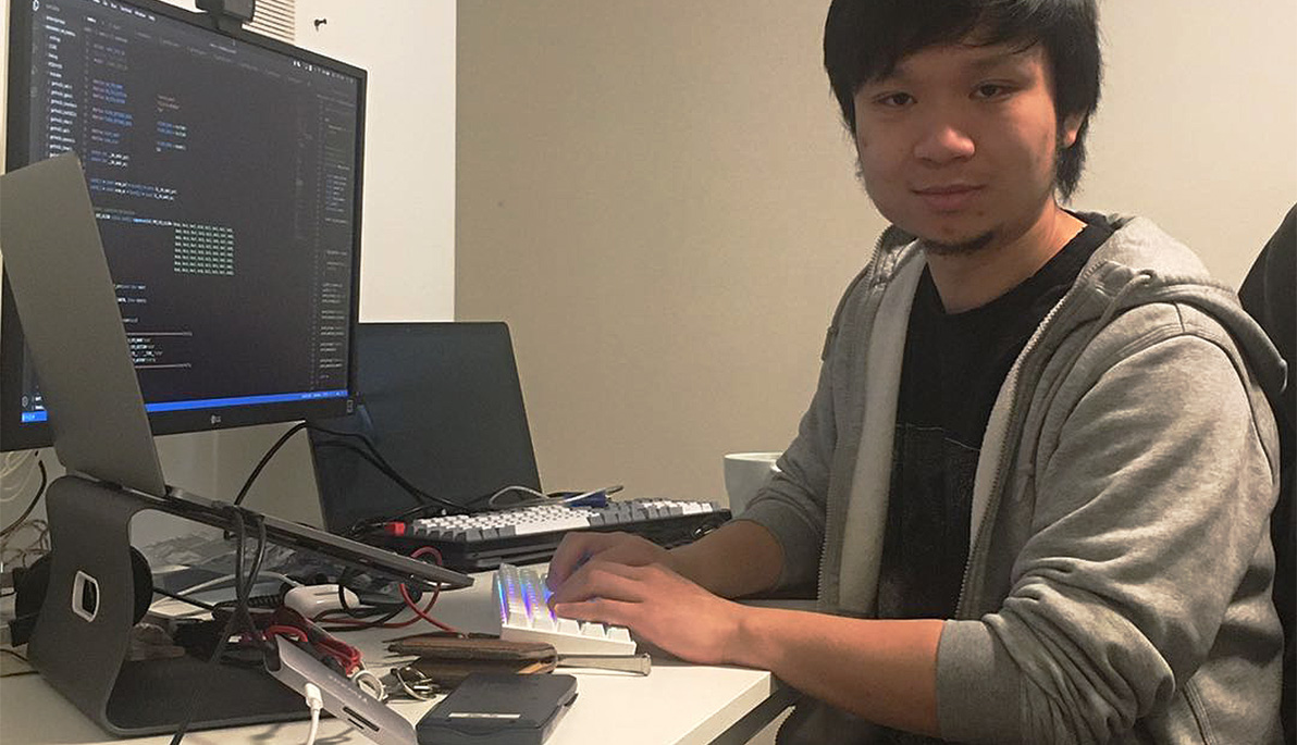 Photo of a student at a computer.