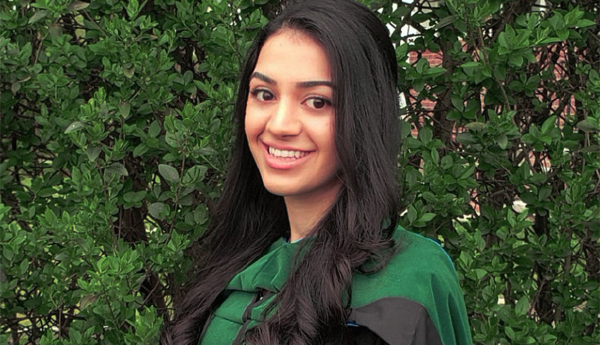 Photo of Jennifer Behbodikhah, D.O. (’20) in graduation robe.