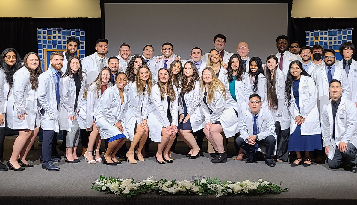 DPT students in their white coats.