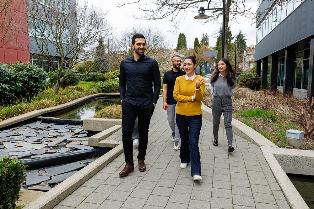 students walking on the campus grounds
