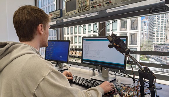 Student working at a computer in a lab on New York Tech's New York City campus