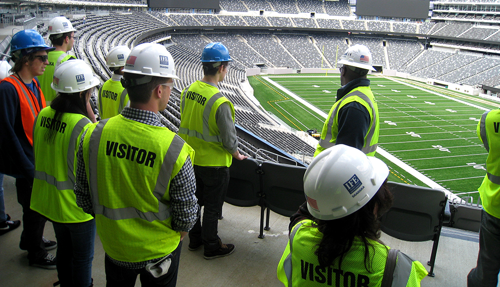 Students taking a tour around a stadium