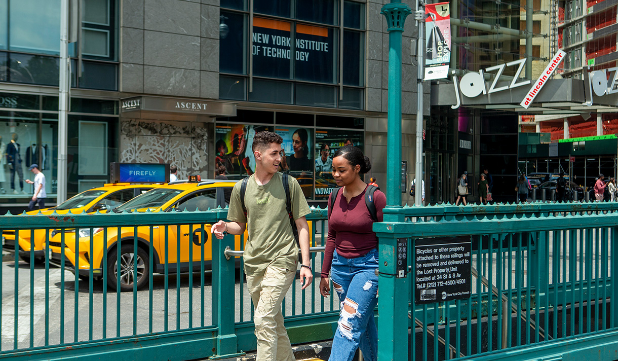 Two students getting out of the subway at Columbus Circle