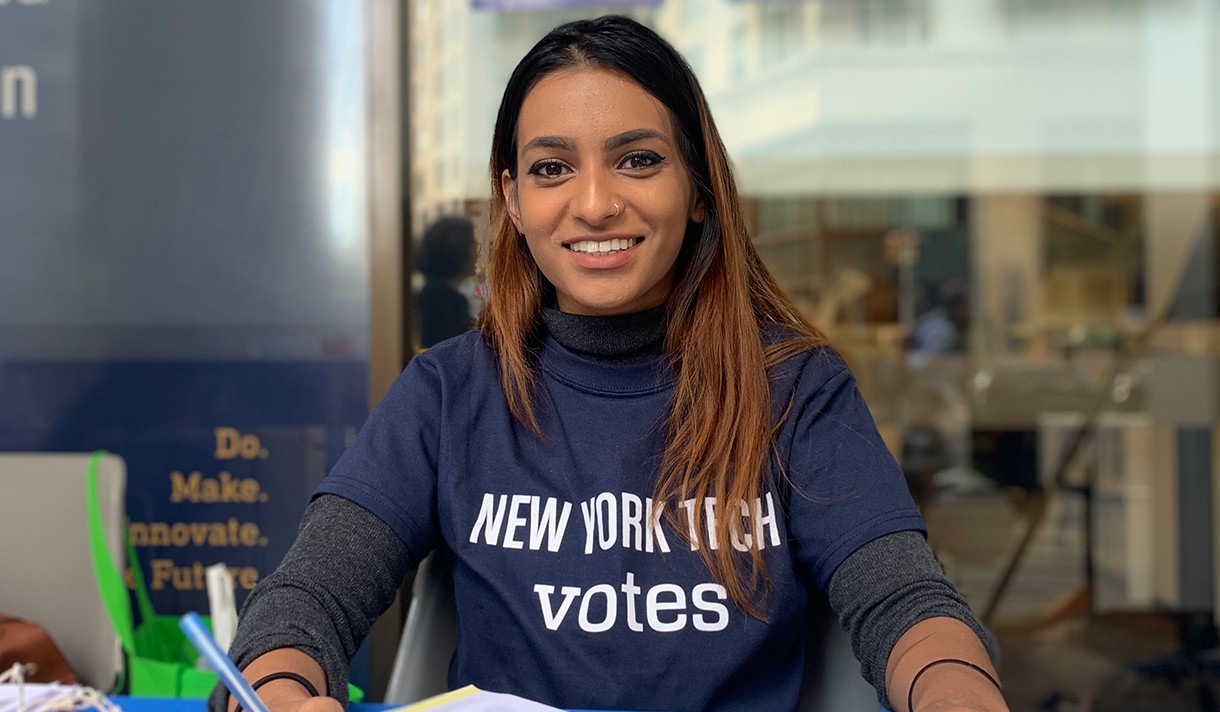 A student wearing a New York Tech Votes shirt