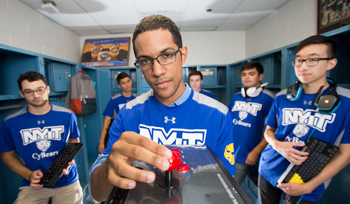 Students in a locker room holding a video game controller