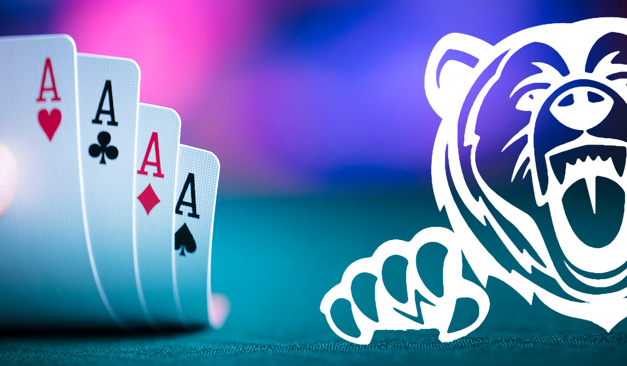 Bear logo on abstract photo of playing cards