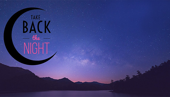 Take Back the Night logo on dark landscape photo