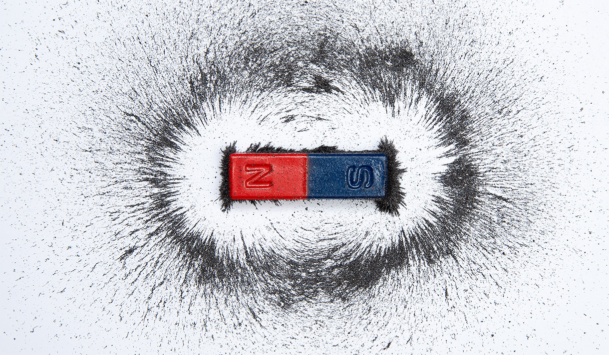 A magnet with a surrounding of iron material. 
