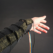  Affective Sleeve, Athina Papadopoulou with Jaclyn Berry: The Αffective sleeve is made from programmable fabrics with embedded shape memory alloys that respond to the wearer's breathing activity by changing shape and temperature to provide haptic feedback in the form of warmth and pressure in order to promote calmness.