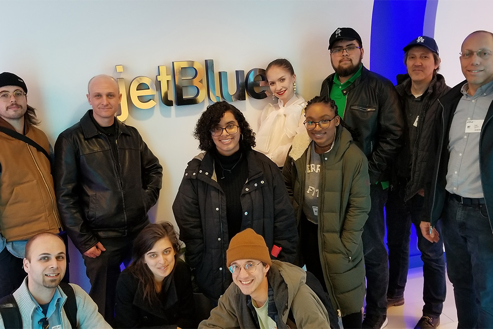 New York Institute of  Technology students and faculty at JetBlue headquarters in Queens, N.Y. Top row: Peter Straehle, Paul Wasneski, Gilary Ramirez, Anastasia Adruzova, Hafsatou Balde, Jareck Pardo, Michael Hosenfeld, and Todd Thaxton; bottom row: Paul DeMonte, Amber Cohen, and Gabriel Intrieri.