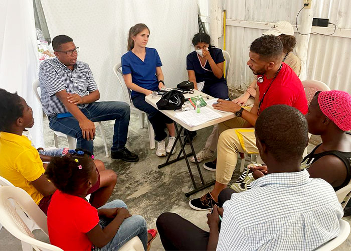 Students and a local physician see patients at a pop-up clinic in the Dominican Republic.
