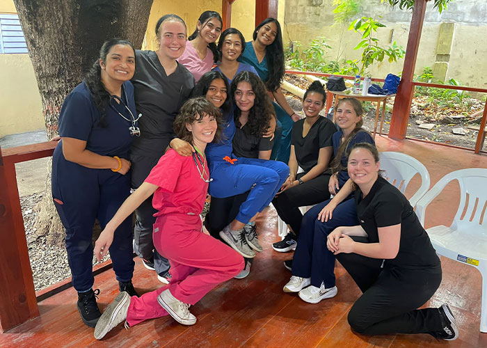 Students pose for a group photo at a clinic in the Dominican Republic.