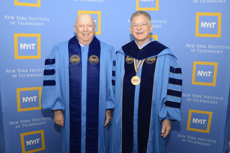 Honorary degree recipient Robert E. Evanson and President Guiliano
