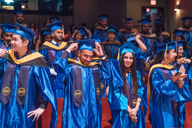 Graduates take their seats at NYIT-Vancouver’s graduation ceremony.