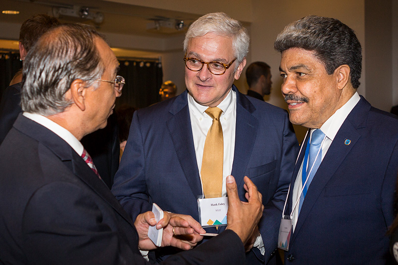 NYIT President Hank Foley greets Eddy Martinez, president of the Instituto Tecnológico de las Américas (left), and Juan R. Ávila, Ambassador of the Dominican Republic to the United Nations (right).