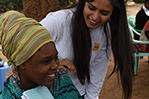 Loveness, one of the women in the group, and Ramendeep Kaur share a special moment.