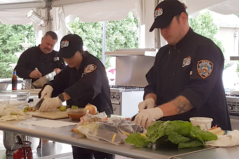 Members of the NYPD get cooking.