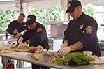Members of the NYPD get cooking.
