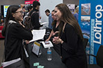 Jill Thomas (B.Arch. ’99) (right) interviews a potential candidate.
