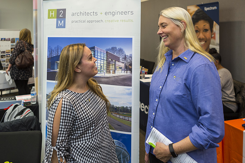 Liz Uzzo (B.P.S. ’85, M.S. ’95) (right) and Megan P. O’Grady (B.Arch. ’13) (left) are just two of the NYIT graduates who work at H2M.