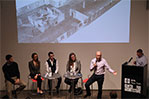 Presenter Michael Donaghy of StructureTone (at podium) leads “Building Better, Faster, and More Collaboratively,” one of the Lightning Talks at AIA’s Edgar A. Tafel Hall. Panelists include, from left, Donal Lyons from StructureTone, Ali Militano from Structuretone, Joshua Progar from PlanGrid, Islay Burgess from Gensler, and Julian Clayton from WeWork.