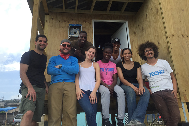 NYIT students volunteering with TECHO to build homes in San Isidro Canovanas, Puerto Rico.
