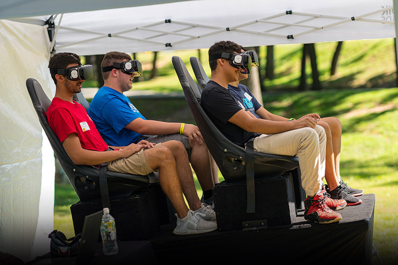 Students go on a virtual roller coaster ride—among other adventures—at the New Student Welcome.