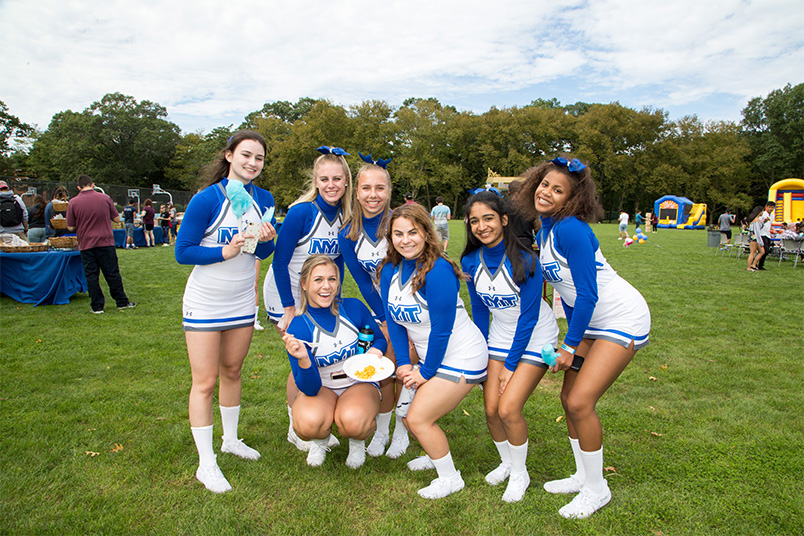 NYIT cheerleaders pose for the camera.