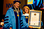 NYIT Board of Trustee Chair Kevin Silva with honorary degree recipient Carol Silva (B.F.A.).