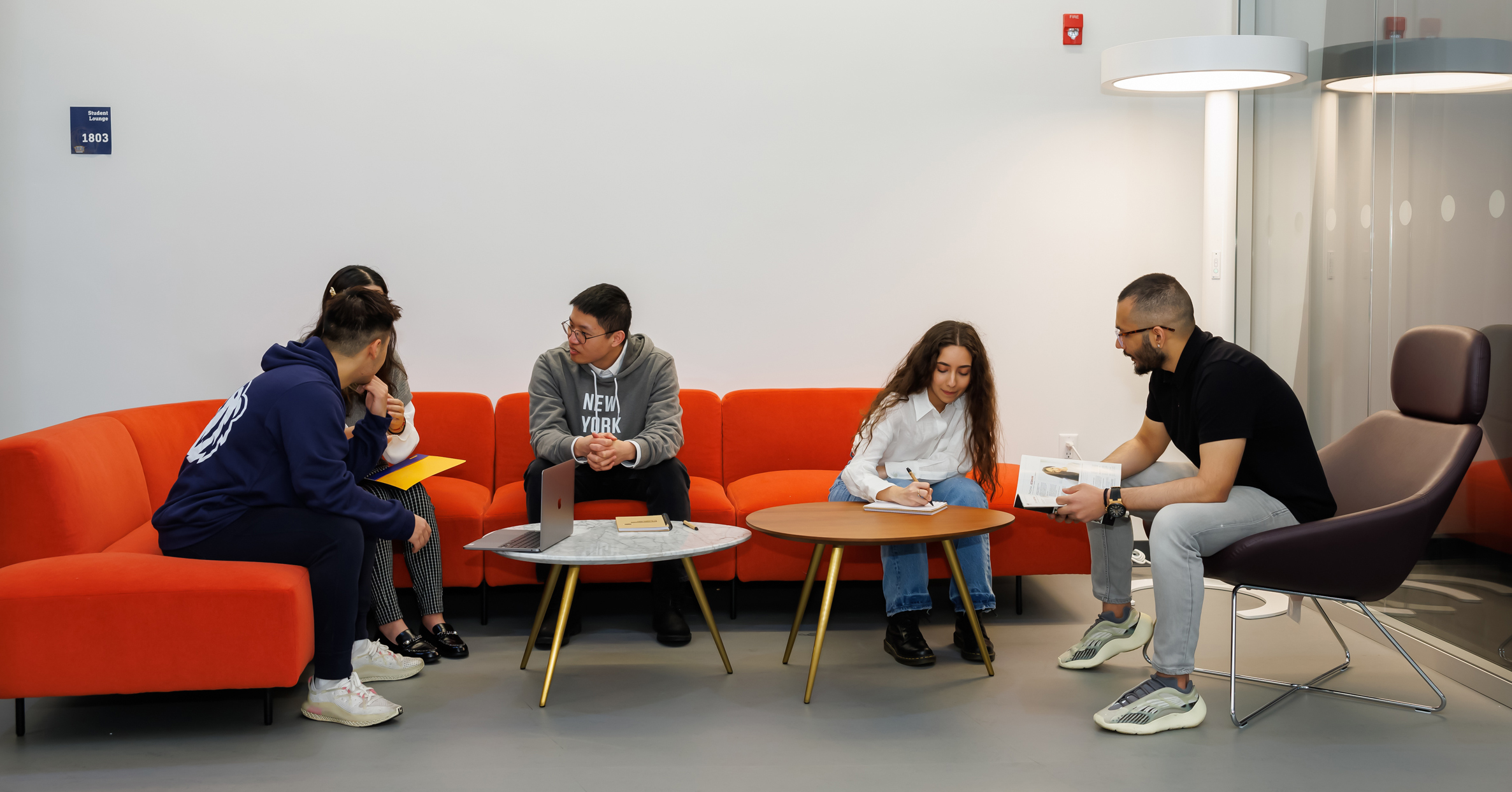 The new spaces feature vibrant colors and include student lounges, plenty of natural light to show off views of the surrounding trees, large classrooms equipped with state-of-the- art technology, and a new green screen studio, among other improvements.