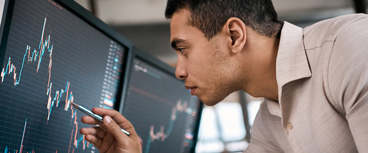 Stock broker checking global currency index