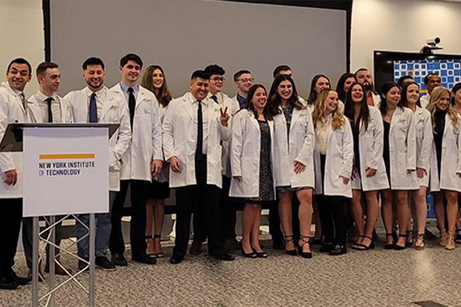 D.P.T. students in Riland auditorium during the white coat ceremony